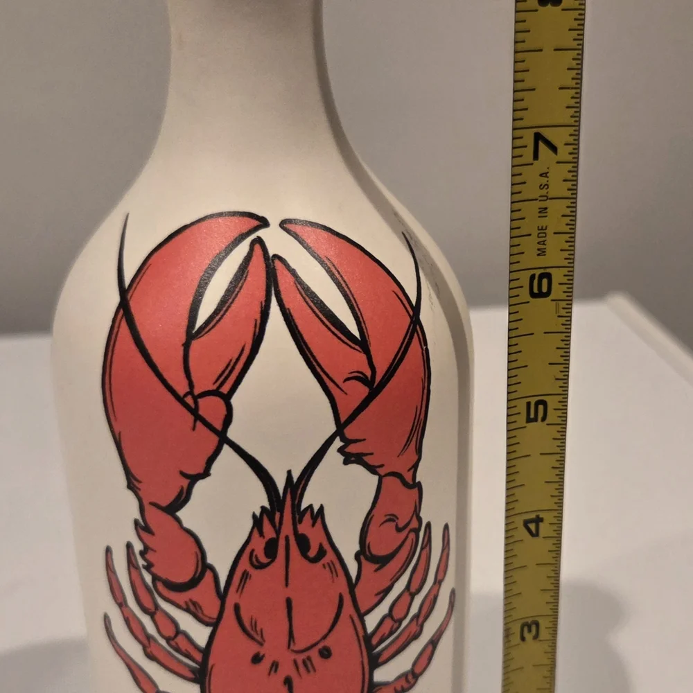 Cream Bottle with Red Lobster Illustration